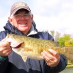 Smallmouth fish caught with signature fishing rods