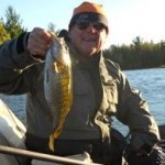 Smallmouth fish caught with signature fishing rods